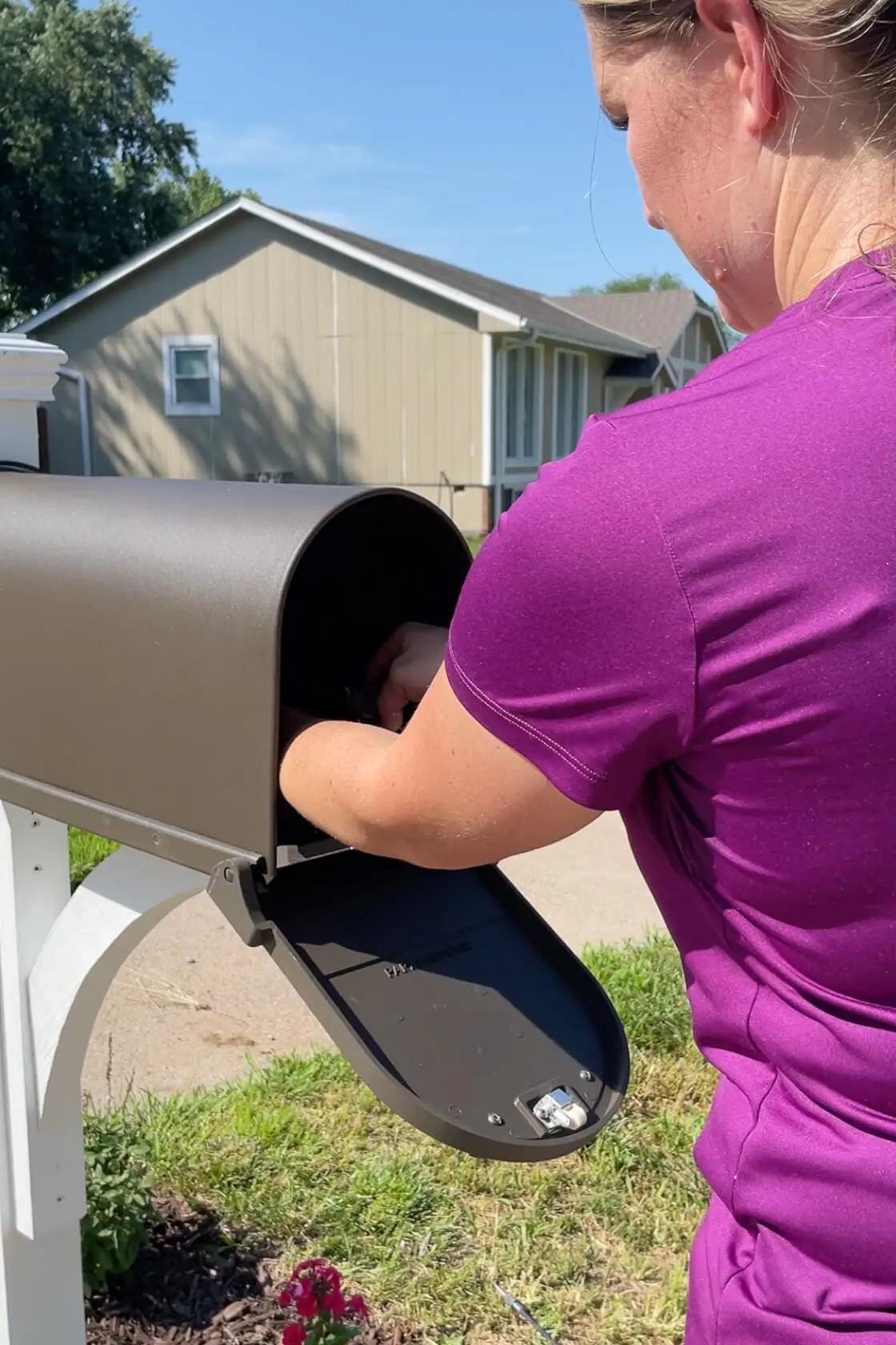 Attaching mailbox to a post.